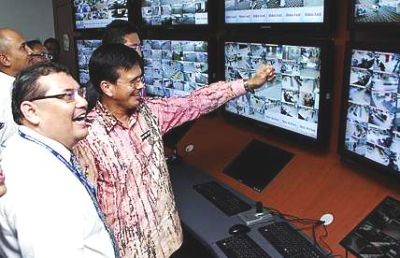 Keeping tabs - Nong Chik with Jaafar (left) checking the CCTV room at the Puduraya terminal